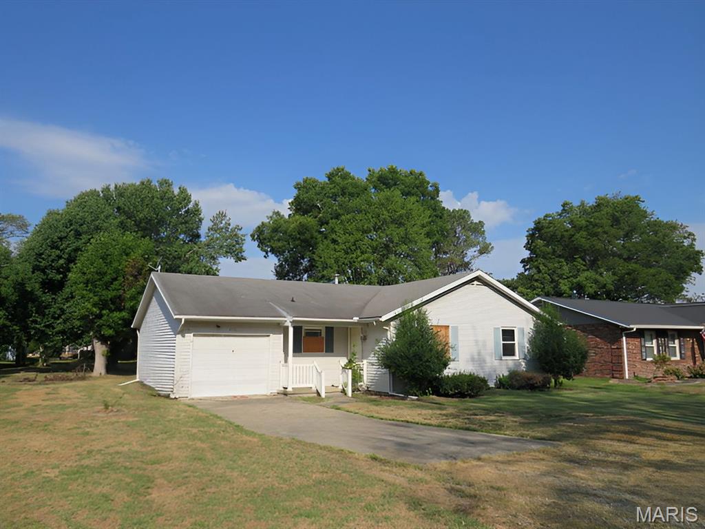This three-bedroom, one-and-a-half-bathroom home presents excellent investment opportunities. The property's solid foundation and functional design create a canvas for value-adding improvements that could significantly enhance market appeal.