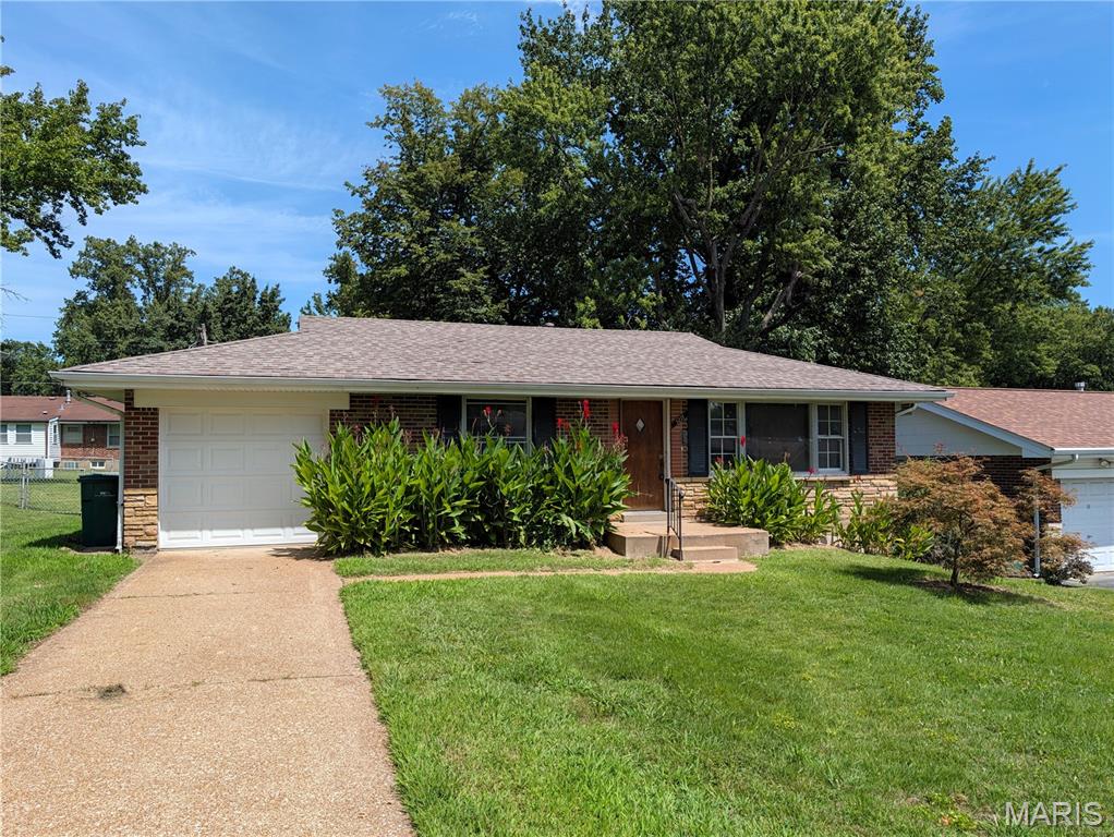 Bring your contractor and your vision to this classic all-brick 2-bedroom, 1-bathroom home with a 1-car garage. This property is a true blank canvas presenting a prime opportunity for a flip or a strong addition to a rental portfolio. Please note: the property requires full rehab due to a previous small kitchen fire and water damage from a burst basement pipe. With solid brick bones and a little sweat equity, there is serious potential to breathe new life into this home. Property is being sold in as-is condition.