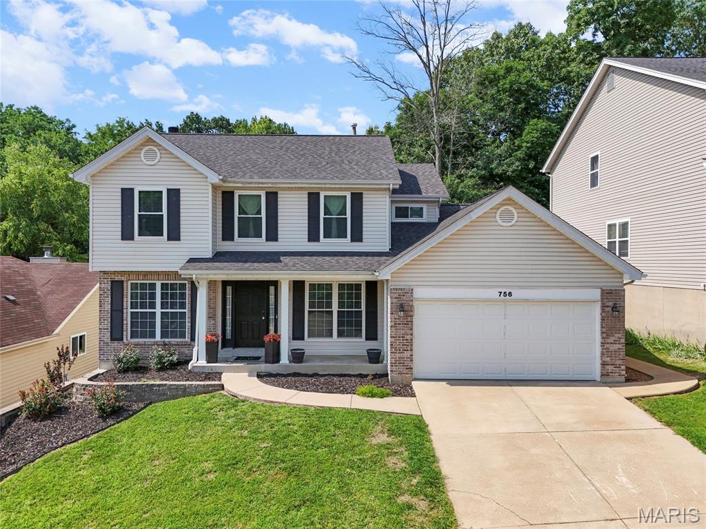 Welcome home to 756 Shadow Pine Drive! This 4-bedroom, 3.5-bath two-story home offers multi-level living and a private, tree-filled backyard that creates a secluded setting. The main floor includes a separate dining room and spacious family room that makes entertaining a breeze. A wall of windows bathes the living room in natural sunlight and accents the cozy vibes of the wood-burning fireplace. The breakfast nook is also airy & bright, opening up to the large back deck! You'll love slow mornings or relaxing evenings here overlooking the serene setting. A modern kitchen provides plenty of cabinet space plus a pantry! Laundry is also on the main floor for added convenience. All bedrooms are on the upper level, including the luxurious primary suite with vaulted ceilings, a walk-in closet, double vanities, and a separate soaking tub! The lower level includes a full bath and room to grow with the potential for a 5th bedroom. Walk out to your gorgeous backyard patio - or enjoy fun in the sun at the community pool! Recent updates include HVAC and garage door (2021) and a new roof (2025) for added peace of mind. Centrally located between Fenton and Arnold. Don't miss out on this amazing home in a great community! Schedule your showing today! Information pulled from various sources. Buyer should verify all MLS data.