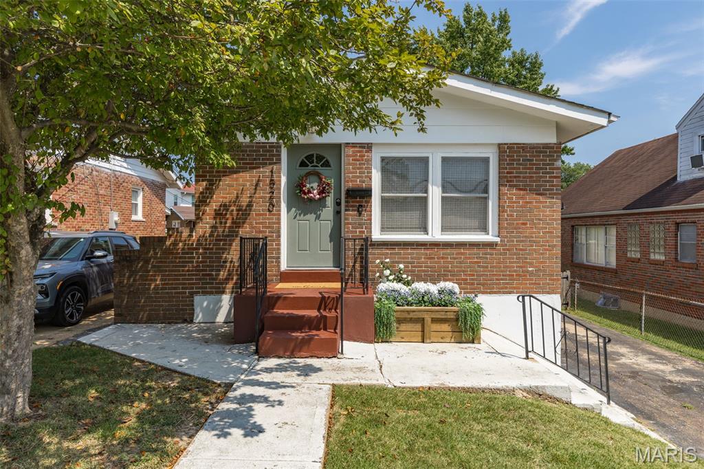 Great Home!  Great Location!  Tons of Upgrades!  Walk through the front door to the family room, dining room, and kitchen in an open floor plan and lots of natural light.  The main level is completed with two bedrooms and two full bathrooms.  Wood floors upstairs excluding bathrooms.  Downstairs features a large, finished recreation area including a dry bar and additional custom bar with updated countertops, a bonus room ideal for office, gaming, or sleeping area, and a half bath.  Outside, start with brick on all four sides of the house, a long driveway that can park multiple cars, a large deck with overhead lighting, a semi-private fenced back yard, and a storage shed.  The house is in a great St. Louis County location 2 minutes from Highway 40/64, 6 minutes from Forest Park, and 11 minutes from downtown, as well as walking distance from multiple parks, restaurants, and shopping.  Upgrades include Roof (2019), HVAC & HWH (2025), shed and slab (2019), oven/stove (2024), dishwasher (2019), washer/dryer (2024), and more that can be noted in the Seller's Disclosure.  Kitchen refrigerator, basement mini fridge, washer/dryer, and microwave all convey with the home.  Come see this one quickly!!
