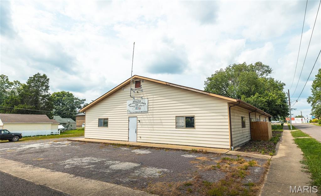 The opportunities are endless with this 5,200 square foot commercial building in the heart of downtown Sullivan. Featuring a highly versatile layout, this property is ready to accommodate a wide variety of business ventures including a daycare, professional office, bank, retail space, restaurant, event venue, dining hall, or storage facility.

The building includes established men’s and women’s restrooms, a spacious commercial style kitchen, and ample open space that can be adapted to fit your needs. Outside, you’ll find plenty of parking, making it convenient for customers, employees, or guests.

Located in a prime downtown location with excellent visibility and easy access, this property offers the space, flexibility, and location to bring your vision to life. Whether you’re expanding an existing business or starting something new, this is an opportunity you won’t want to miss.