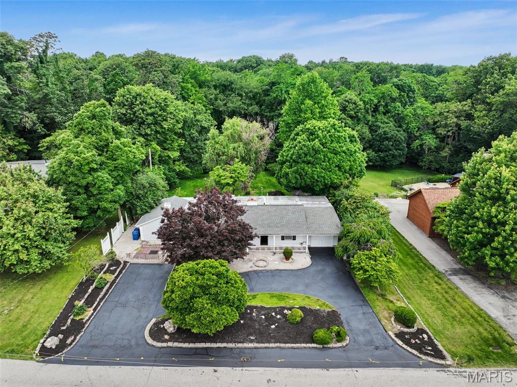 JOIN THE OTHER TEAR DOWNS! Ranch Home Nestled on 1 Acre Lot on Garden Lane! Home with no Basement could be Tear Down.  Room for a Pool. The  Feel of Tranquil Living surrounded by Homes with Large Lots! Minutes to Creve Coeur Park. City of Maryland Heights Amenities.  Parkway Schools.  Minutes to Westport and Highway Access.  Great Location!