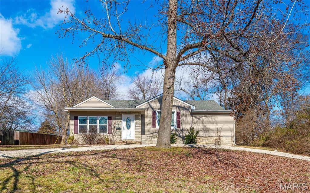 Welcome home to this beautifully updated ranch in the heart of Festus! This charming ranch blends the comfort of a classic single-story layout with the freshness of modern touches, all set on .4 +/- acres that gives it breathing room and a sense of privacy. Tucked away at the street’s end, you’ll never know you’re living in town. Step inside to find a spacious open living and dining area filled with natural light, updated flooring, and neutral paint tones that create a warm and inviting feel throughout. The large eat-in kitchen offers ample cabinet and counter space and convenient access to the backyard—perfect for everyday living and entertaining alike. Offering approximately 1,462 sq ft, this home features comfortable living spaces, a functional layout, and plenty of room both inside and out. Outside, enjoy the oversized backyard with mature trees and room to relax, garden, entertain, or simply enjoy the peaceful setting. Conveniently located near schools, shopping, dining, and easy highway access while still offering a tucked-away feel, this move-in ready home is one you won’t want to miss!