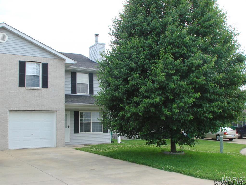 Three Bedroom Duplex Provides 19 x 13 Living Room with Brick Hearth Fireplace, Kitchen Includes Electric Range, Dishwasher, Garbage Disposal and Refrigerator, 15 x 14 Dining Area Walks Out to Back Deck, Main Floor Half Bathroom and Separate Utility Room, Second Floor Provides 17 x 16 Master Bedroom with Double Closet Space and Walk Separate In Closet, Private Master Bathroom, 15 x 11 Second Bedroom, 13 x 13 Third Bedroom, Second Floor Hallway Bathroom, Available Now.