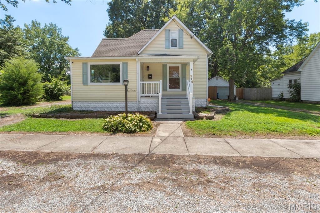 This 3-bedroom, 2-bath home has plenty to offer, from its character-filled interior to the large fenced backyard and impressive garage space. The open-concept living and dining area gives the home a spacious feel and flows into an adorable kitchen with plenty of personality.

The large fenced backyard gives you room to spread out—let the kids play, give the dog room to run, or create the garden you've always wanted. A deck provides a great spot to enjoy the outdoors.

Need storage? There’s plenty of it. The large outbuildingwith electricity could easily accommodate a boat or lake toys for Lake of Egypt, serve as a workshop, or provide the extra space you've been looking for. A second detached single-car garage adds even more parking, storage, or workspace options.

With many updates already completed, two detached garages, a spacious fenced yard, and a home full of character, this one gives you room to make it your own.  New windows, 4 year old roof and new gutters add peace of mind and efficiency.