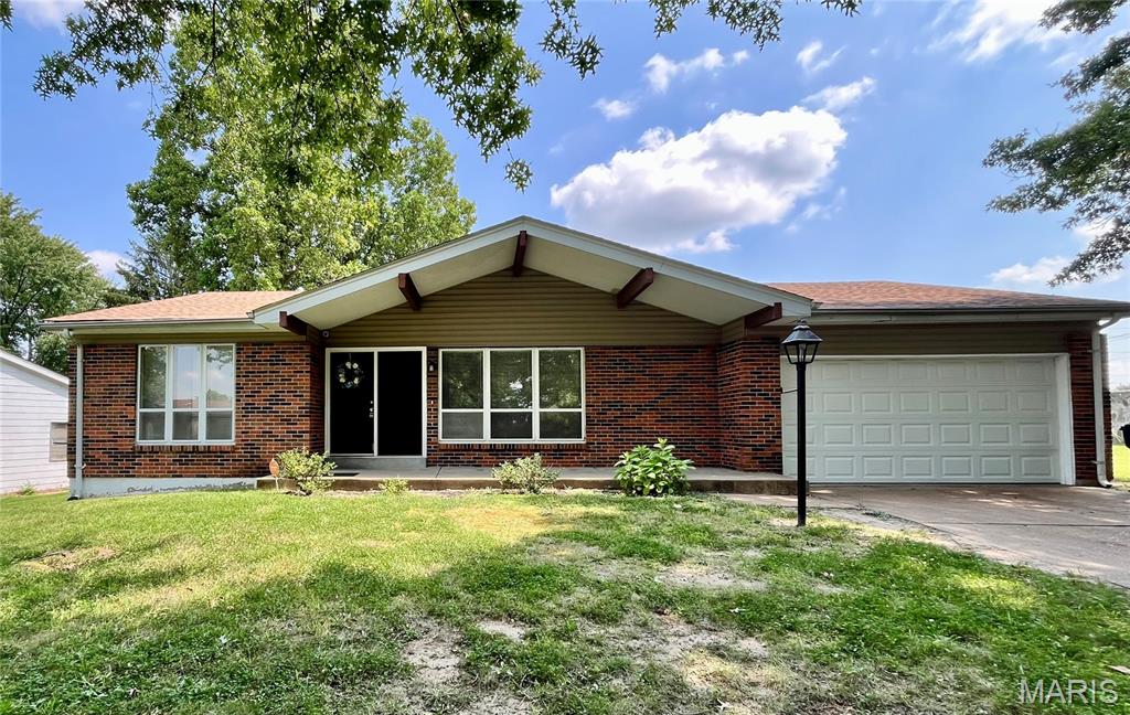 Everything you are looking for 3 bedrooms 2 full baths* 2 car garage* Move in ready* Gleaming hardwood floors* not only do they look good they are easy to care for* All kitchen appliances to stay including the fridge, nice bonus for the first time buyer*Lg living room when you first walk in is so inviting * This is a wonderful floor plan with a family room that is open to kitchen & has a  fireplace ( makes it very warm & homey)* A great place to gather*Basement is an open canvas* Low maintenance exterior with enclosed soffit & fascia & vinyl siding *Lg fenced yard to enjoy * Convenient location*