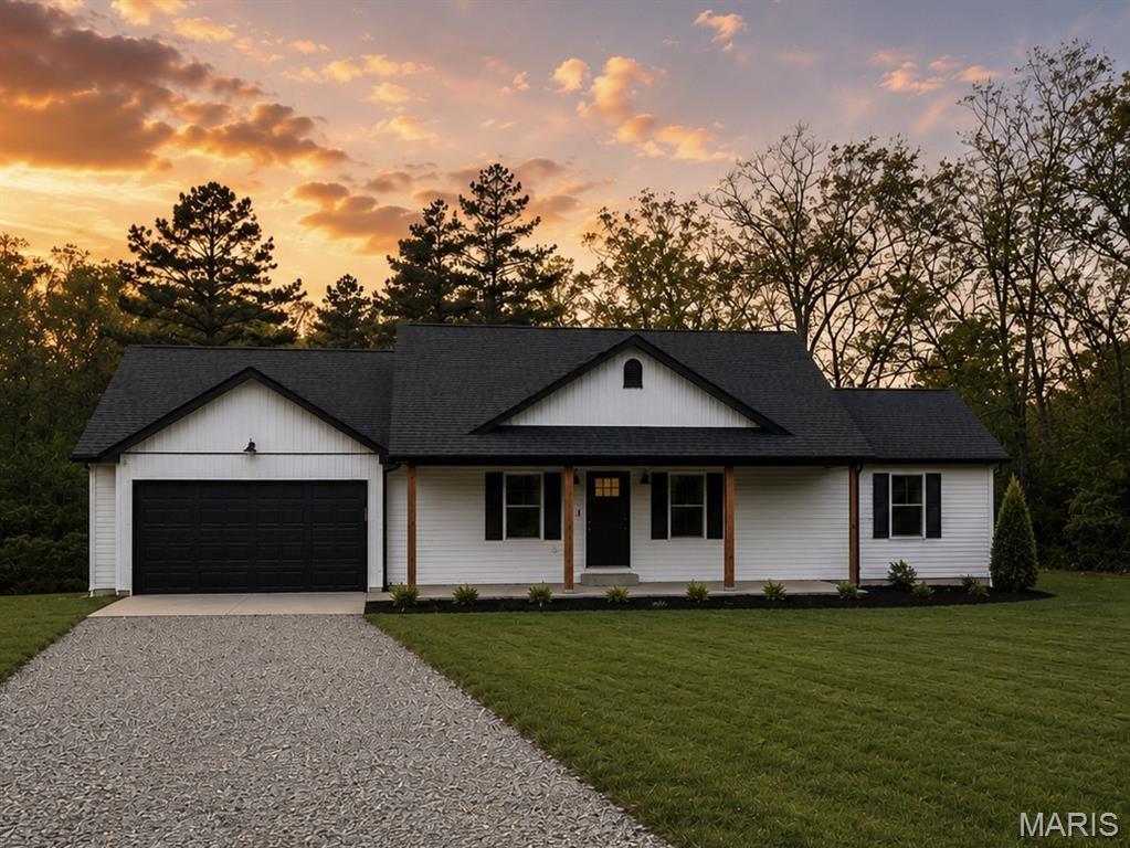 Welcome to your private slice of country paradise! Nestled on 5 beautiful acres, this spacious 4-bedroom, 3-bath home offers the perfect combination of comfort, functionality, and outdoor living.

Step inside to discover a thoughtfully designed layout with plenty of room for family and guests. The finished basement provides additional living space ideal for a family room, game room, home office, or guest suite, giving everyone room to spread out and enjoy.

Outside is where this property truly shines. The lush, professionally sodded yard creates incredible curb appeal and provides a beautiful setting for outdoor gatherings, recreation, and everyday enjoyment. A springtime creek that meanders through the property, adding natural beauty, peaceful views, and a serene atmosphere that's hard to find.

Need space for projects, equipment, or extra storage? The impressive 30x40 detached shop is ready to accommodate your hobbies, business needs, vehicles, or recreational toys.

Whether you're catching crawdads in the creek, enjoying the expansive acreage, or making use of the versatile shop and finished basement, this property offers the lifestyle you've been dreaming of. Experience the tranquility of country living with all the space and amenities you need to feel right at home.

Don't miss this rare opportunity to own a beautiful home with acreage, a shop, a finished basement, a manicured sodded yard, and a picturesque creek—all in one exceptional property.