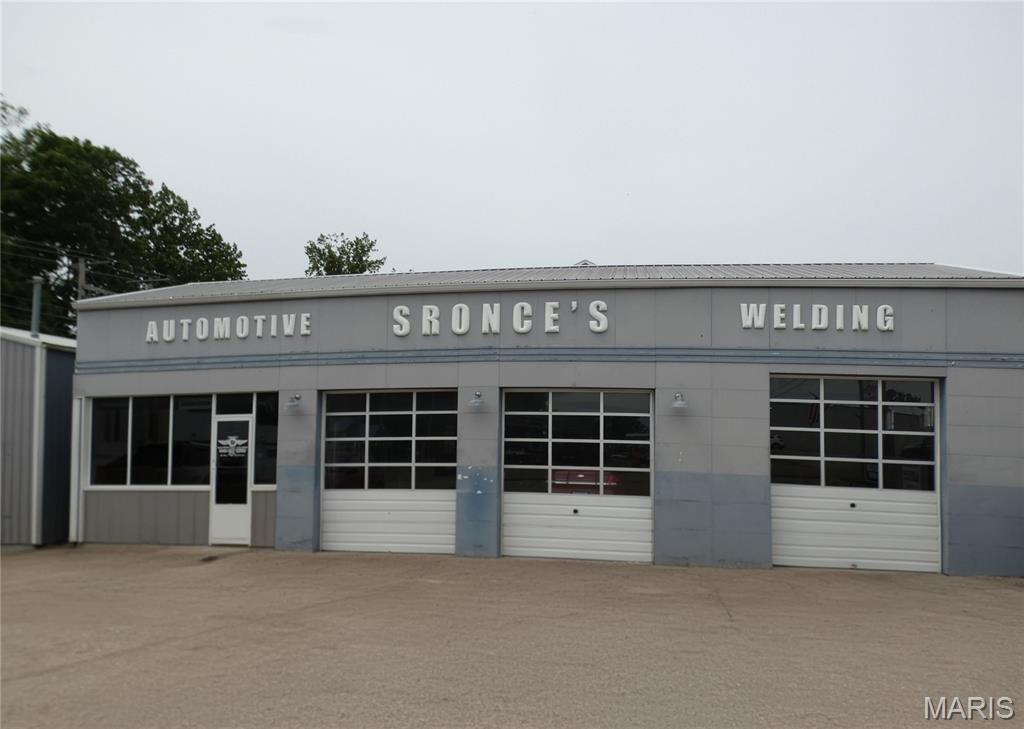 This well-maintained commercial property offers a fantastic opportunity for an owner-operator or investor. Located on Highway 154, it provides excellent visibility and convenient access for customers.
Currently operating as an automotive service business, the facility includes four bays—two equipped for oil changes and three with hydraulic lifts. Inside, you'll find a welcoming lobby with a sales counter, a private office with storage, and a bathroom. The office is climate-controlled with a mini-split system, while the shop is heated with an oil furnace.
Additional features include a 24' x 32' pole barn that is currently being used for storage—providing ample space for equipment, inventory, or future expansion.
Services currently provided include tire service and general maintenance. Employees are willing to stay on, ensuring a smooth transition for those looking to continue the existing business.
Alternatively, the building can be sold without the business, tools, or lifts. The space would be ideal for a variety of uses such as a paint shop, auto body repair, small engine repair, ATV or lawn mower repair, electrical business, or construction-related use.
Contact the listing agent for separate pricing if purchasing the building alone without the business.