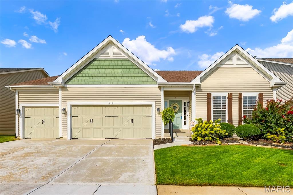 Welcome to a home that beautifully blends modern style with the comfort and ease of everyday living. Located in the desirable Countryshire neighborhood of Lake St. Louis, this updated 4-bedroom ranch offers an inviting open floor plan, thoughtful finishes, and plenty of space to gather, relax, and enjoy life at home. Luxury vinyl plank flooring flows throughout the main level, creating a clean, cohesive feel from room to room. At the heart of the home is the STUNNING kitchen, remodeled in 2021 with gorgeous quartz countertops, a large center island with seating along two sides, soft-close cabinetry, subway tile backsplash, and sleek stainless steel appliances, including a 5-burner gas cooktop and hood. The kitchen opens naturally to the living room, where a wood-burning fireplace adds warmth and character, while tinted windows span the the back of the home filling the space with natural light. A separate dining room provides an inviting space for entertaining. The spacious primary bedroom suite is a relaxing retreat with a private bath featuring dual sinks, separate tub and shower, and a large walk-in closet. Two additional main-level bedrooms share a full hall bath, creating a desirable split-bedroom layout, while the main-floor laundry adds everyday convenience. 
The finished lower level takes the living space to another level with a family room, recreation room with bar, fourth bedroom, full bath, and two flexible bonus spaces ready to become a home office, fitness area, creative space, or whatever your lifestyle calls for. Outside, the spacious wood deck creates the perfect spot for morning coffee or evening gatherings and steps down to a patio with a relaxing hot tub that stays with the home. The fully fenced yard features an irrigation system to keep the yard looking its best, while the 3-car garage provides plenty of room for vehicles, storage, and hobbies.
Residents of Countryshire enjoy exceptional amenities including walking trails, playgrounds, picnic areas, a community pool, and sports courts. Conveniently located within walking distance of local schools and just minutes from shopping, dining, and easy access to Highways 40/64 and 364. From morning coffee on the deck to unwinding in the backyard hot tub or enjoying the neighborhood amenities, this home is designed for enjoying life at home. Come see for yourself.