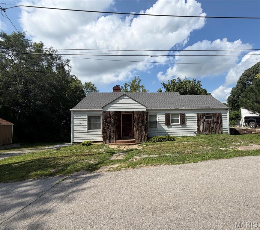2 bed 2 bath home on a dead end with a wood burning fireplace. Hardwood floors, large primary bedroom with full primary bathroom. New roof 2023. Property is being sold as is.