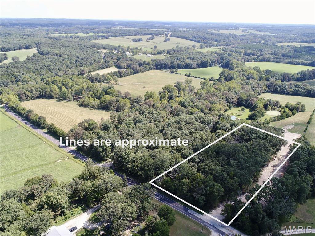 Beautiful 3+ acre building lot in a private rural setting! Conveniently located just off blacktop on Seminary Road and approximately 10 minutes from Sullivan, this property offers an excellent location with the privacy and seclusion of a wooded setting. The terrain provides a prime opportunity for a home with a walkout basement, while the surrounding woods offer a peaceful backdrop. A great spot to build your dream home and enjoy country living without being far from town!