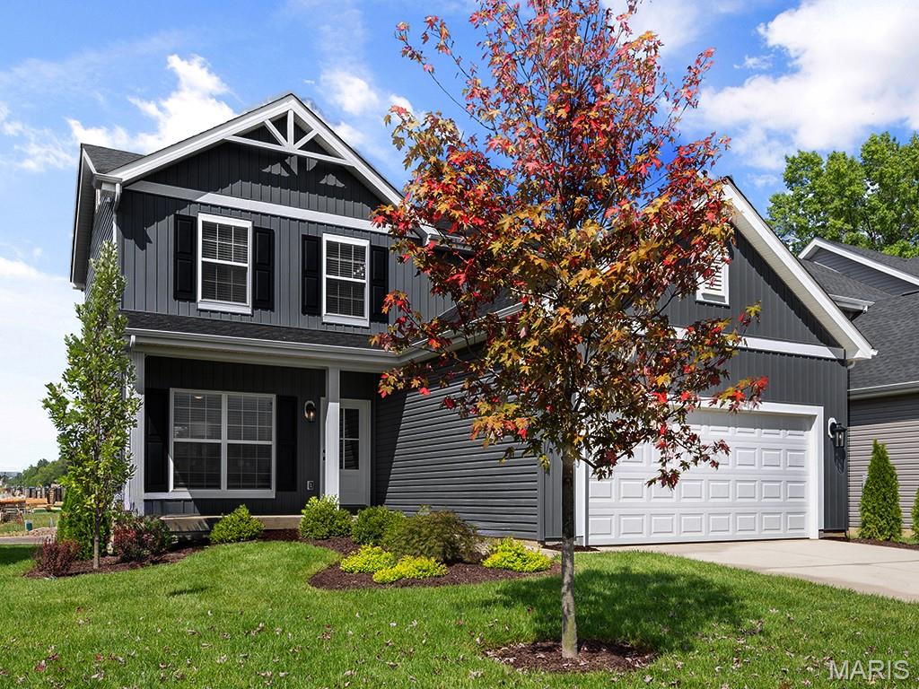 Brand New McBride Homes Berwick 2 -story 3BR, 2.5BA move-in ready this summer! Farmhouse exterior & walkout homesite! Perfect for entertaining, enjoy wood laminate flooring & 6’ windows on main level. Kitchen has White 42” cabinetry, center island w/breakfast bar, quartz countertops & stainless GE appliances. Breakfast rm w/sliding glass door to backyard. Huge living room w/ceiling fan & 2 large windows. Upstairs master suite w/walkin closet, private bath w/double sinks, 5’ walkin shower, & linen closet. 2 more bedrms, full bath & laundry add convenience. Extras include 2-panel white interior doors, powder rm, upgraded lighting/plumbing fixture, LL ¾ bath rough-in & more! Winding Meadows offers new homes w/a serene country feel, minutes from Gravois Bluffs & in the Northwest School District. With easy access to Hwy 141, 30, & I-270 for shopping/entertainment. Enjoy peace of mind with McBride Homes’ 10 year builders warranty & incredible customer service! Similar photos shown.