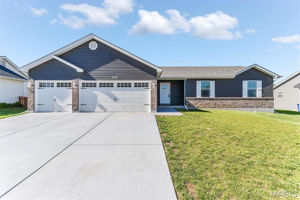 $0 down USDA eligible! This 3BD/2BA ranch with 3-CAR GARAGE is full of UPGRADES! Foyer, vaulted great room opens to
the dining rm & kitchen w/pantry, stainless steel appliances (smoothtop range, built-in microwave, dishwasher), 42inch soft close cabinets & granite/quartz counters. Vaulted Primary Suite w/walk-in closet, shower w/seat & double-bowl adult height vanity. Also MFL, lever door handles, ceiling fan in great room & all bedrooms, icemaker water line,
TV/internet/phone jacks in all bdrms & 2 in great room! The walkout LL has a full bath rough-in, sump pit/pump + 50-
gallon HWH. Exterior offers 30-year architectural shingles, maintenance free vinyl siding, enclosed soffit & fascia & partial-brick
front. Energy savings: low-E windows, R-38/R-13 insulation.
Incredible Ranch Home tucked away on a quiet cul-de-sac in Wright City, this beautifully maintained 3-bedroom ranch
offers the perfect blend of comfort, style, and privacy. Just 4 years young, this home feels like new and is filled with
thoughtful upgrades throughout. Step inside to a bright, open floor plan. The kitchen is truly the heart of the home. The
fridge stays making the home truly move-in ready! 
Landscaping includes white and purple azealeas, 2 fruit trees at the bottom of the hill are pear trees, two fruit trees at the at the top left side are peach trees. and the 2 on the right are apple trees.  The four bushes are blackberry, chokeberry, blueberry, and raspberry.  
Kitchen Refrigerator, washer and dryer stay.