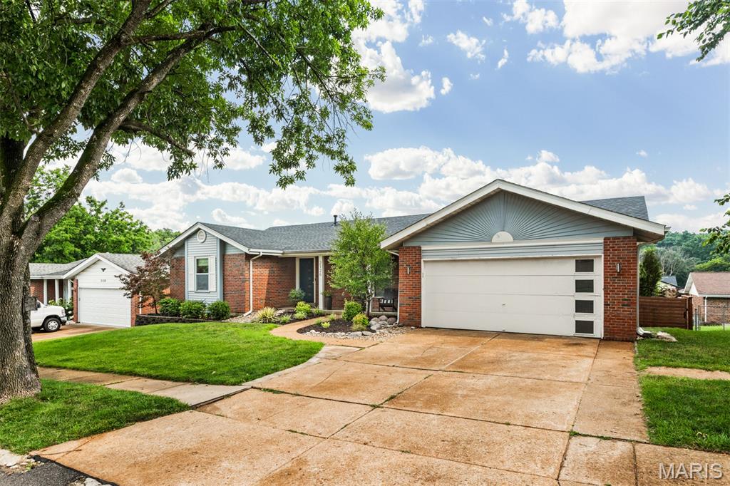 Welcome to 2126 England Town Rd! Located in a family-friendly neighborhood just down the street from Cliff Cave Park, this fashionably updated 3-bedroom, 3-bath home has so much to offer!

The main floor features a bright, functional layout with spacious living areas, modern accents, and wood flooring. The updated kitchen maximizes space and opens to a cozy family room with a wood-burning fireplace. Through the French doors, there is a bright sunroom that can serve as a breakfast area, office, playroom, or additional living space.

The standout walkout basement includes two bonus rooms, a recreation room, a laundry area, and a full bathroom—ideal for guests, older children, or extra entertaining space.

The backyard serves as a private oasis, completely fenced and equipped with a covered bar and full electricity, raised garden beds, and a fire pit for those cooler evenings.  
The property also includes a 2-car garage with two additional parking spots out front.  Additionally, the surrounding community offers access to a pool, basketball court, sand volleyball, and playgrounds.

So call your favorite Realtor and make sure not to miss this one.
