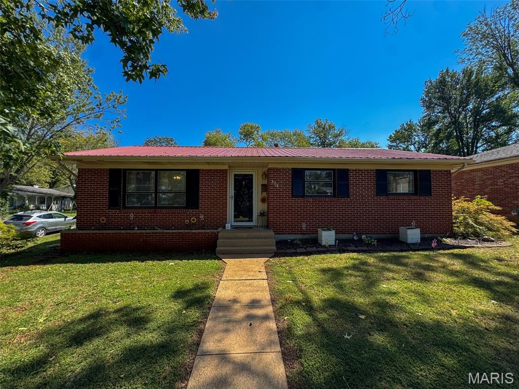 Charming brick home in Farmington, MO. This 1,200 sq ft home offers 3 bedrooms and 1 full bath in a low-maintenance, single-story layout. Solid brick construction and a functional floor plan make this a great option for a first-time buyer or anyone looking to downsize. Additional features include ceiling fans in the bedrooms and living room, a covered carport, and a screened-in back porch with a brick half-wall, ideal for enjoying the outdoors. The home sits on a level, tree-shaded lot with an established lawn and landscaping. Conveniently located in Farmington with easy access to local schools, shopping, and dining. Schedule your showing today.