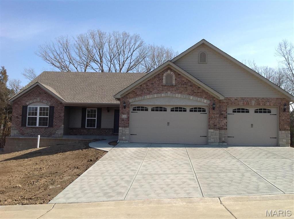 Photos are of previously sold homes and may have upgraded options added to them. This 1800 sq ft. Ranch comes standard with 3 car garage, craftsman front, architectural shingles, house wrap, grids in front windows, vaulted ceilings, upgraded cabinets with soft door door and drawers, crown molding on kitchen cabinets, granite counter-tops, built-in microwave,  open staircase, water line for ice maker, double bowl sink in Master Bath, 5 inch baseboards, full bath rough-in at the lower level and vinyl plank flooring. Too many features to mention here. A truly must see home.