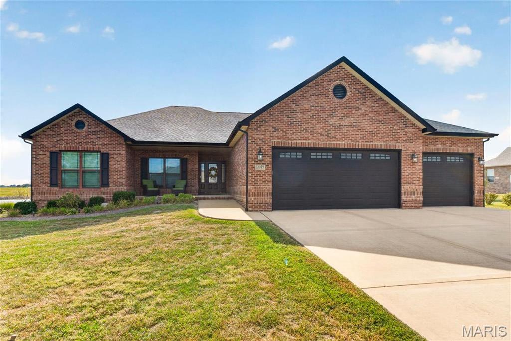 The one you have been waiting for! This stunning custom-built 4-bedroom, 3.5-bathroom ranch retreat in the rural Arbor View Acres offers the perfect blend of luxury and efficiency. Nestled on a private, lake view, 4.05-acre lot in a quiet cul-de-sac, this geothermal home features an open-concept main floor with distressed asian walnut engineered wood floors, ceramic tile floors, crown molding, and a gourmet kitchen equipped with loads of custom cabinetry with crown molding, granite countertops, center island, walk-in pantry and stainless steel appliances. The seamless flow extends to a screened-in patio and spacious primary bedroom suite with garden soaking tub, large walk in shower with bench and swing glass shower door and large walk-in closet, while the expansive lower level is an entertainer’s dream, complete with a large family and recreation room, a kids’ spiral slide, bonus bedrooms, full bathroom, a massive bar, and a walk-out through man door or overhead glass windowed garage door to a private backyard oasis featuring a large stone patio, firepit, stone fireplace, dock, and lake access. With a dedicated office, hearth room with fireplace, large laundry room, oversized 3-car garage with additional rear entry for mowers and premium finishes throughout, this Freeburg School District gem offers unparalleled comfort and modern style. Don’t miss out on this unique, gorgeous home!