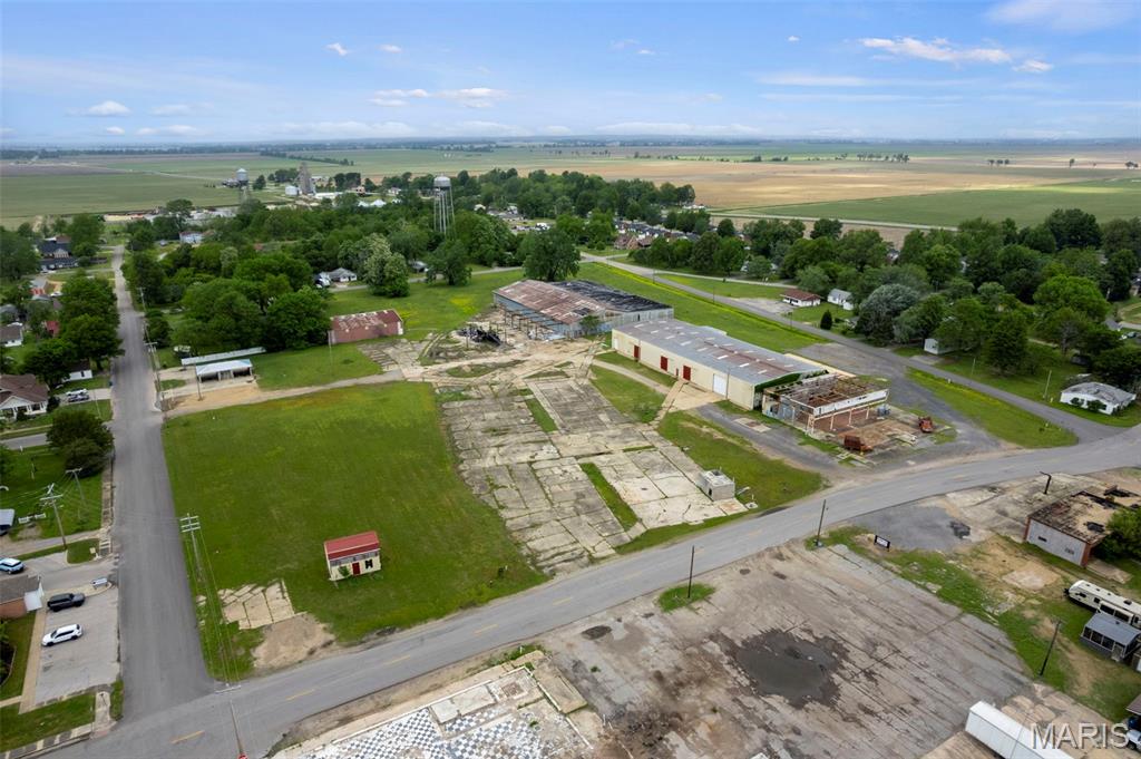 Prime opportunity on 8.20; acres in Gideon, MO with direct frontage on North Main Street.

This property features a 16,800; sq ft functional warehouse currently in use, offering an open floor plan, steel frame construction, concrete floors, and multiple access points including overhead, sliding, and roll-up doors. The site also includes a loading dock and loading well, making it well suited for distribution, storage, or industrial use.

In addition, the property includes a 4,900; sq ft shop building with concrete floors and an open layout ideal for equipment storage, workspace, or support operations.

A secondary 26,500; sq ft warehouse structure is also present on the property. While currently not operational and considered to have limited contributory value, it presents a significant opportunity for redevelopment, renovation, or repurposing.

Additional improvements include a concrete block building and portable structure, adding further flexibility to the site.

Situated on level ground with strong accessibility and multiple structures already in place, this property offers space, functionality, and upside for an owner-user or investor.

Opportunities with this kind of footprint and potential don’t come around often.