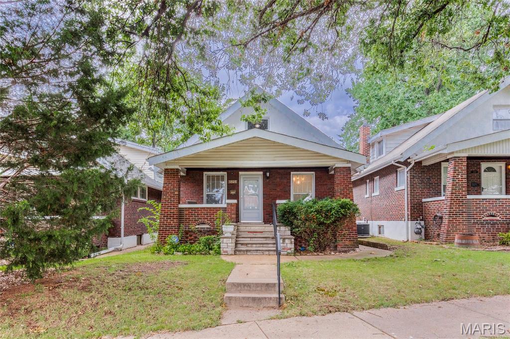 Brick bungalow located on a quiet cul de sac and walking distance to Tillies Park, Ted Drewes, Bayers Garden, restaurants and stores. The expansive front porch and rear covered porch are 2 great areas to enjoy.  Newly painted inside.  Open kitchen includes a breakfast room, game area, and a den/family room. Upstairs are 2 more bedrooms and another family room. 2 non-conforming rooms in the basement.  Lots of space here. An of course there is formal living and dining too. The 2 car detached garage and fenced yard add to this great home. You going to love living here - located close to Hwy 44.
