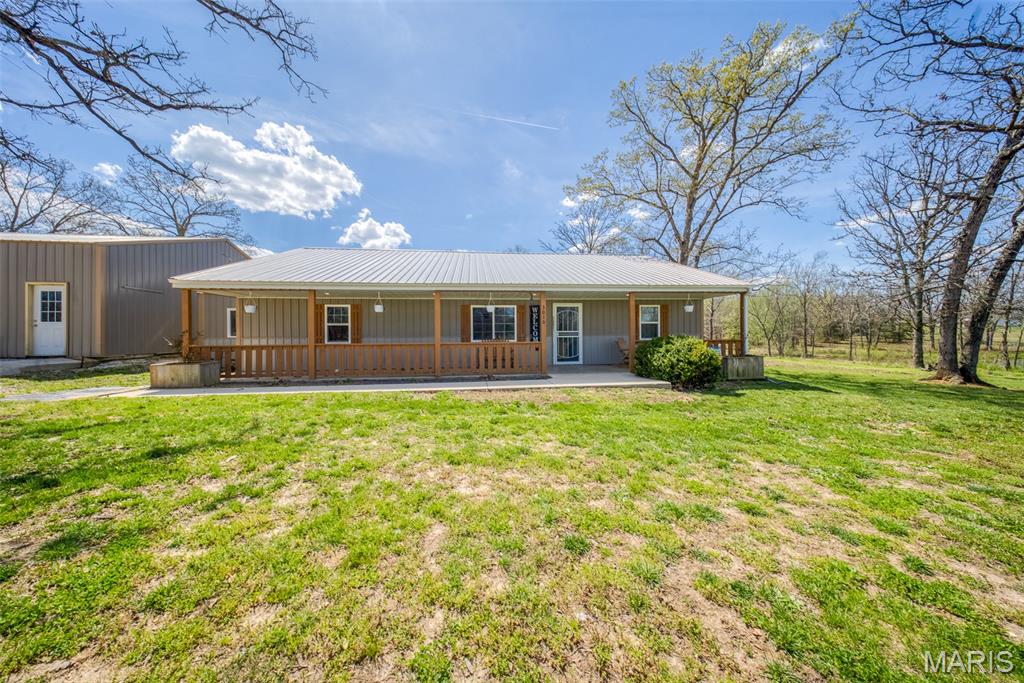 Escape to the perfect blend of comfort, functionality, and wide-open space with this 3 bedroom, 2 bathroom home on nearly 10 acres in Salem! Designed with a desirable split floor plan, this home features a spacious great room with cathedral ceilings, creating an open and inviting atmosphere. The kitchen is a standout with custom oak cabinetry, a center island, and stainless steel appliances—perfect for both everyday living and entertaining. The primary suite offers a relaxing retreat with a walk-in closet, double vanity, jetted tub, and separate shower. Accessibility is thoughtfully considered with 36” interior doorways. Additional features include an electric heat pump with supplemental gas wall unit and central air for year-round comfort. Built to last, this slab home boasts 2x6 exterior walls, durable metal siding and roof, and quality Pella windows. Outside, you’ll find a detached 2-car garage/shop with concrete floors and electric, plus a finished man cave complete with a mini split system. A lean-to adds extra covered space, along with a 20x24 concrete carport and an additional 24x20 concrete pad. The land is equally impressive, offering approximately 8 acres of open pasture with perimeter fencing (steel corners and 5-strand barbed wire), plus a ~2 acre m/l established food plot featuring wheat, clover, turnips, and cow peas—ideal for hunting or livestock. Enjoy evenings around the firepit, and take advantage of the playground set for outdoor fun. Property includes a lagoon, shared well, and shared driveway. If you’ve been searching for a versatile property with room to roam, this one checks all the boxes! What are you waiting for? Schedule your private tour today!