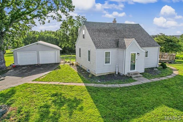 Located along US Highway 61 in Ste. Genevieve, this well-maintained 1.5-story home offers 3 bedrooms, 3 bathrooms, and approximately 1,500 square feet of comfortable living space. Recent updates include new flooring throughout much of the home, giving it a fresh, move-in-ready feel. The functional floor plan features a desirable main-floor laundry room, spacious living areas, and an unfinished basement that provides excellent storage or the opportunity to finish additional living space to suit your needs. Outside, the fenced backyard offers a secure area for children, pets, or outdoor entertainment. A standout feature of the property is the detached three-car garage, complete with heating and air conditioning, making it ideal for vehicle storage, a workshop, hobby space, or home business use. Served by public water and located within the Ste. Genevieve School District, the property also has fiber internet service available for fast, reliable connectivity. With convenient highway access and practical features both inside and out, this home is well-suited for a variety of buyers looking to enjoy everything Ste. Genevieve has to offer.