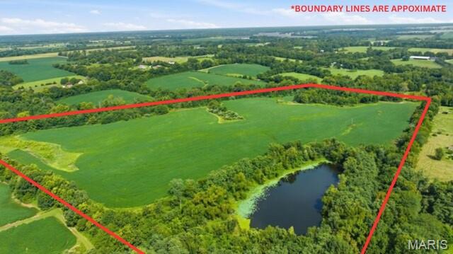 UNRESTRICTED PRIME LAND!!! Exceptional opportunity to own approximately 45+/- acres of gently rolling, wooded and open acreage—offering outstanding potential for development, investment, recreation, or a private estate. The property features two nice-sized ponds, tillable acreage, and beautiful natural topography, providing a rare combination of usability and scenery. Ideal for residential development, estate lots, a private luxury estate, recreational use, or a mixed-use investment. With 750+- feet of road frontage and Electric on site, the development possibilities are substantial. Conveniently located just minutes from shopping, dining, and quick access to I-70, this is PRIME LAND positioned for future growth and accessibility. Opportunities like this are hard to find!