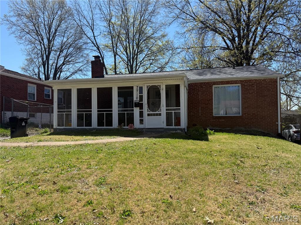 Charming all-brick 2-bedroom, 1-bath home located on a quiet street in desirable University City. This well-maintained property features new hardwood floors, a spacious living room with a functional fireplace, separate dining room, and a screened-in porch perfect for relaxing or entertaining. The finished lower level includes an egress window, offering additional living space and potential for a future bedroom or home office. This property invites you to envision a life of comfort and convenience. Conveniently located near parks, shopping, restaurants, and major highways. To truly appreciate the potential of this exceptional property, we invite your inquiry and a personal viewing. Property is being sold as-is. Seller is motivated and welcomes offers.