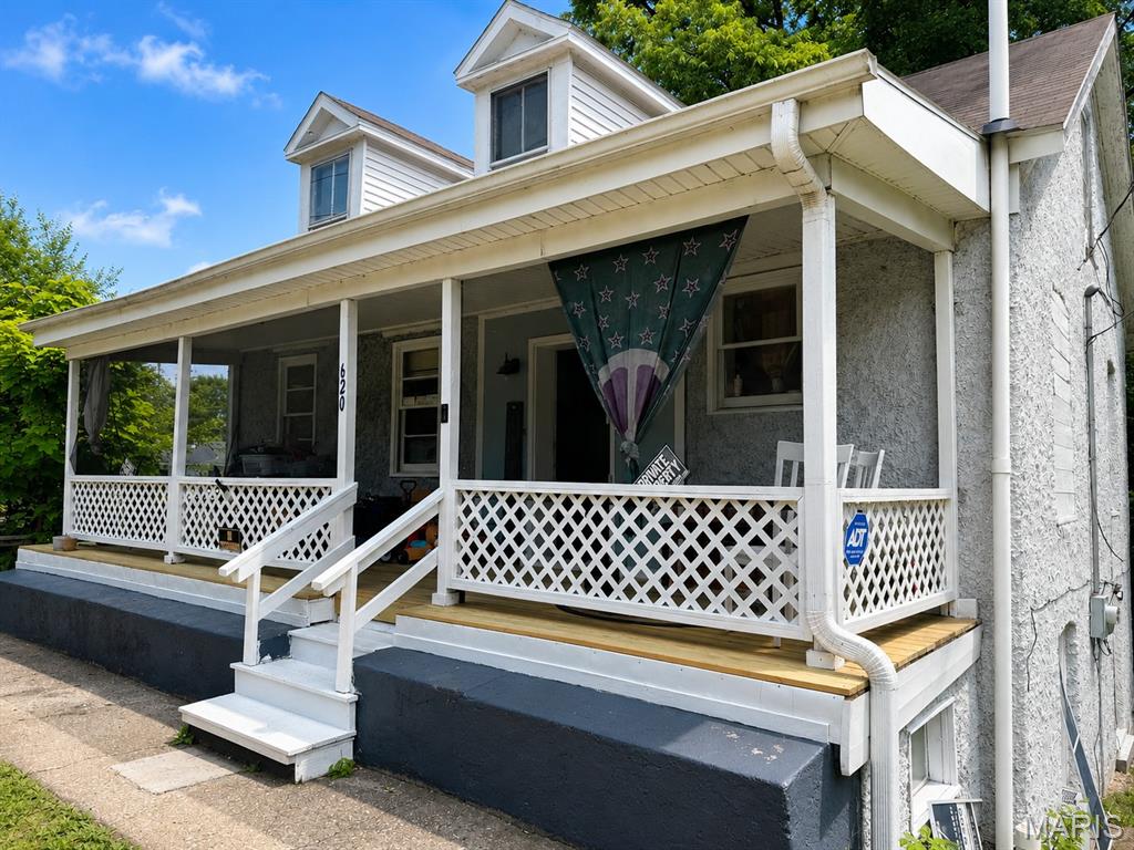 Looking for space, potential, and a large lot without breaking the budget? This unique home offers over 2,500 square feet of living space on more than half an acre in a quiet neighborhood setting. The main level features two spacious bedrooms, a full bathroom, and a large living area filled with natural light. The walkout lower level offers a flexible layout with a primary suite, kitchen, oversized laundry room, and additional storage space, creating opportunities for multi-generational living, added privacy, or a creative use of space to fit your needs. Outside, you'll find a partially fenced yard with plenty of room for pets, gardening, outdoor entertaining, or future improvements. Large front porch has all new boards and paint.With solid square footage, a generous lot, and room to build equity through updates and personal touches, this property is a fantastic opportunity for first-time buyers, investors, or anyone looking for an affordable home with endless potential. Bring your vision and see all this property has to offer! Home is selling as-is