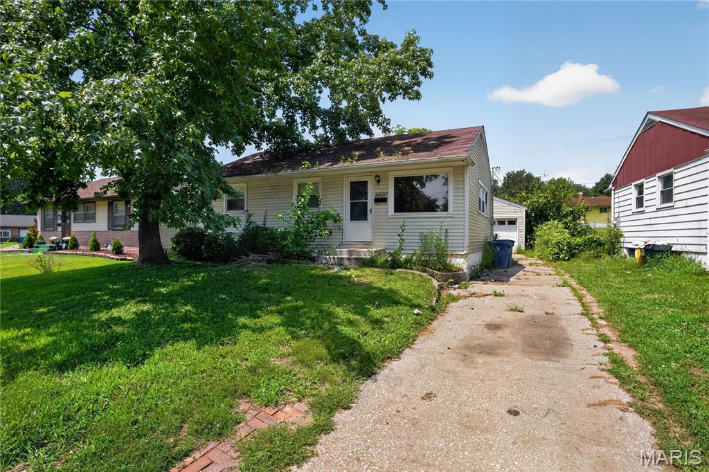 Welcome home to this charming 3-bedroom 1-bathroom ranch offering comfortable one-level living with a full basement for added storage or future finishing potential. The bright living room flows into an eat-in kitchen with ample cabinet space, while hardwood floors add warmth throughout much of the main level. Enjoy a spacious, level backyard ideal for entertaining, gardening, or relaxing outdoors. A detached 1-car garage and convenient location near shopping, dining, parks, schools, and major highways complete this inviting home.