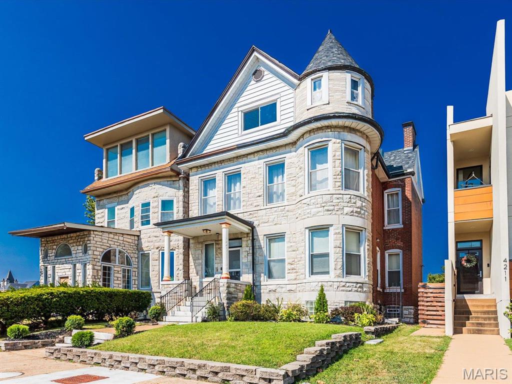 Your Central West End dream home has hit the market! Gorgeous Victorian w/ soaring 10 ft ceilings, crown molding & 5 decorative fireplaces! Original quarter-sawn oak millwork (never painted!) showcases generations of care. Step into the impressive foyer w/ marble fireplace & grand staircase. Living room flows into separate dining room, both w/ hardwood flooring & fireplaces. Unique turret gives 3 rooms rounded space. Updated kitchen w/ granite countertops, stainless steel appliances, pantry cabinets & center island. Enjoy autumn weather on the covered deck. Main floor laundry. Primary bedroom suite includes sitting room w/ fireplace & full bath. With six bedrooms there is plenty of room for that office, family room, & man cave you've been dreaming of! So much space the possibilities are endless! Best of all, you can live this Victorian dream worry-free w/ all recently updated systems including newer furnace/AC, electrical panel, water main, PVC sewer lateral, water heater & roof! Suitable for Bed/Brk