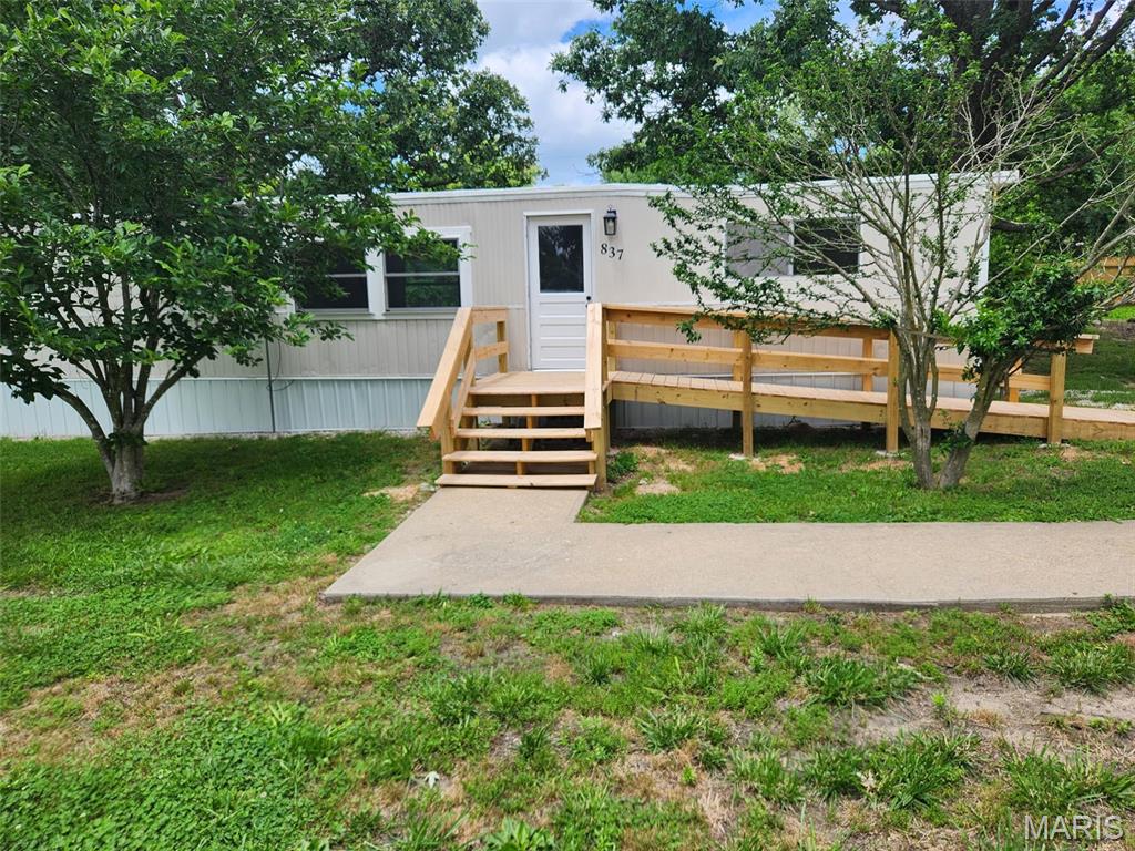 Welcome to 837 Dwight in Lebanon, Missouri! This beautifully renovated 2-bedroom, 2-bath manufactured home offers the perfect combination of modern updates and affordable living inside the city limits.
Nearly everything has been updated, including new plumbing, flooring, paint, windows, heat and air conditioning, and completely remodeled bathrooms. Enjoy relaxing on the brand-new front and rear decks, perfect for morning coffee or evening gatherings.
Situated on a spacious lot in a desirable neighborhood, this property offers plenty of room for gardening, outdoor activities, and additional storage with the included shed. Conveniently located just minutes from the local high school and city parks, you'll enjoy easy access to everyday amenities while still having room to spread out. Outdoor enthusiasts will appreciate being only 15 minutes from Bennett Spring State Park, one of Missouri's premier destinations for trout fishing, hiking, camping, and year-round recreation.

Best of all, this home is truly move-in ready and has already passed city inspection for added peace of mind. Whether you're looking for your first home, downsizing, or a vacation home to Bennett, 837 Dwight is a fantastic opportunity you won't want to miss!