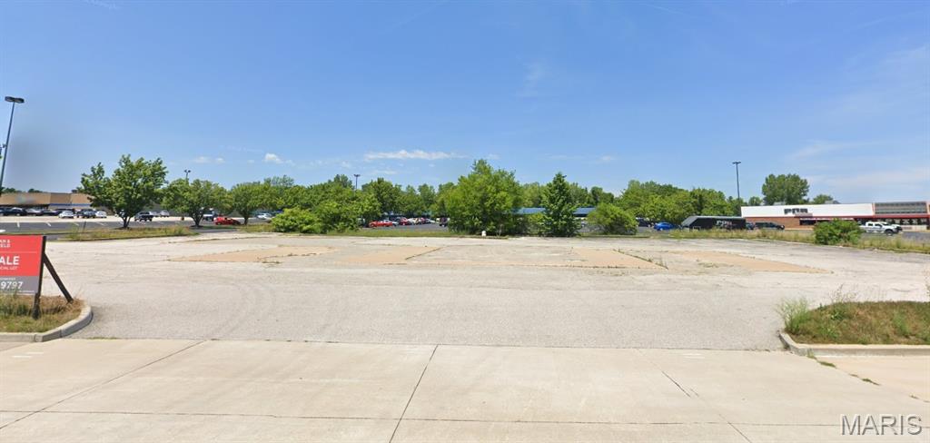 Take advantage of this highly visible .84+/- acre Commercial lot located at 3735 Harry S. Truman Blvd., just off the Cave Springs exit from I-70. Zoned C-3, this versatile property if ideal for retail, food and beverage, a laundromat, or other high-traffic commercial uses. The site includes an existing asphalt parking lot and utilities available to site. Surrounded by thriving businesses - gas stations, restaurants, shopping center, and car dealerships - this location offers excellent exposure and accessibility. With an Average Annual Daily Traffic (AADT) of 6,374, your business will benefit from steady local and commuter traffic along with easy access to I-70. Listed at $12/sq. ft., this is a smart place to build or expand your business in a busy St. Charles corridor.