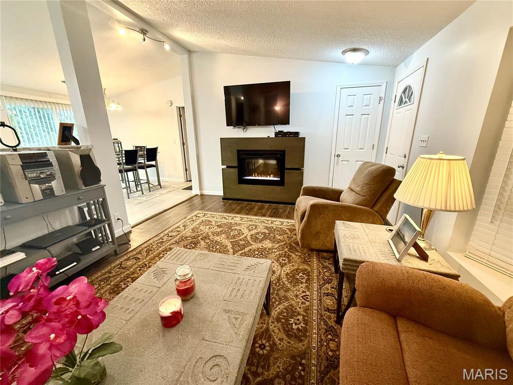 If you have been looking for a home in Goose Creek with all the amenities, including all the furniture! Also includes a 2019 Sun-tracker pontoon with the perfect covered parking space. All located on a lovely wooded corner lot off of a paved street. The home features 3 bedrooms and 2 full baths on the main floor and another bedroom and half bath on the lower level. Open floor plan concept on both levels, larger covered front porch with nice decorative string lights for outdoor living and activities. Two car garage in the basement area of the home with an additional garage detached just outside.  Lighted separate pavilion with table and swing. Horse shoe pits with lights, area can accommodate corn hole as well. Two fantastic fire pits. There is even a fenced turn out for the puppy! This home has had a complete overhaul and the seller has kept documented photos in books left in the home to view. The property has not been lived in full time by this seller, but kept as a vacation home for weekends and summer getaway’s! It is in great condition and ready for its next family to enjoy!