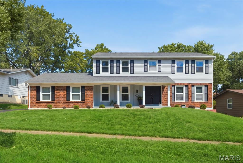 STUNNING RENOVATED TWO-STORY HOME WITH EXTENSIVE UPGRADES! Prepare to be impressed by this beautifully updated residence offering the perfect combination of modern style, warmth, and exceptional living space.
Step inside to discover gorgeous hardwood floors throughout, soothing lighting, and inviting neutral décor that creates a fresh, sophisticated atmosphere. The modernized kitchen is designed to impress, featuring stainless steel appliances, spacious cabinetry, generous workspace, and an effortless flow for everyday living and entertaining.
Relax in the luxurious living room or gather in the spacious family room, where a striking exposed-brick fireplace adds warmth, character, and timeless charm. Sliding glass doors open to a picturesque backyard and newly paved patio, creating the perfect setting for outdoor dining, entertaining, or simply unwinding. An intimate dining room provides an elegant space for holiday dinners and memorable gatherings.
Upstairs, you'll find four spacious bedrooms with abundant upgraded closet space and closet organization systems. The impressive primary suite offers a beautifully upgraded private bath featuring a separate tub and shower, updated fixtures, and stylish finishes. The hall bathroom has also been tastefully upgraded.
The living space continues in the finished lower level, complete with new carpeting and an open, versatile layout that's perfect for entertaining, a recreation room, home theater, fitness area, or additional gathering space. 
Step outside and discover your own private backyard retreat, where the newly paved patio provides the perfect setting for summer barbecues, alfresco dining, morning coffee, or relaxing evenings under the stars. The picturesque backyard offers plenty of possibilities—create a cozy outdoor lounge, add a fire pit for cool evenings, design a beautiful garden oasis, or simply enjoy the open space with family and friends. Whether hosting lively weekend gatherings, celebrating special occasions, or enjoying a peaceful afternoon outdoors, this inviting backyard and patio are ready to become the backdrop for countless memorable moments.
With its extensive renovations, beautiful hardwood flooring, modern kitchen, updated bathrooms, impressive storage, finished lower level, and inviting indoor-outdoor living spaces, this home delivers the comfort, character, and upgrades today's buyers are searching for. Beautifully updated and ready to impress—this is one you won't want to miss!  Tour soon so you can prepare to impress your guest this fall, winter and upcoming holidays.
