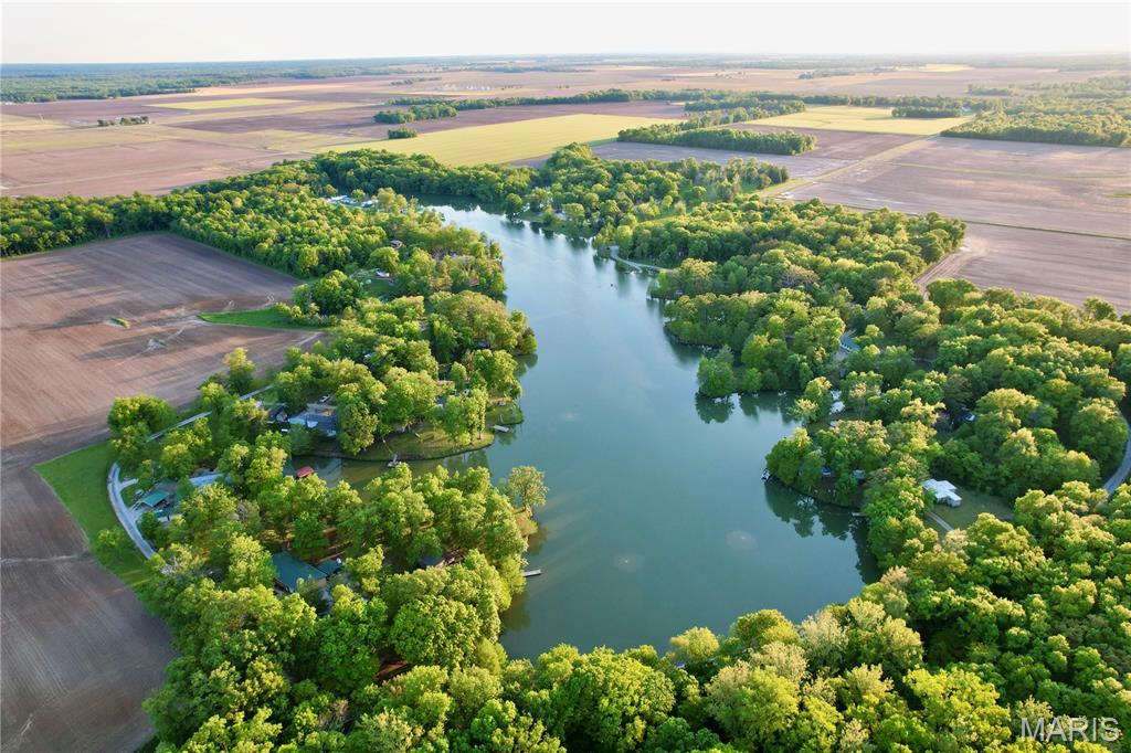 Recreational Getaway with Private Hunting Access

Here’s an opportunity to own an affordable recreational getaway in Alma, Illinois with access to a much larger outdoor experience. This approximately 0.23+/- acre parcel comes equipped with a 2004 camper, making it an ideal basecamp for hunting and weekend recreation.

The camper is accompanied by a 1,500-gallon holding tank and electric hookup, providing the essentials for comfortable stays at the property. Even better, the purchase includes private access to approximately 105 acres of hunting ground, giving the new owner plenty of room to enjoy the outdoors and pursue local wildlife.
The property sits in a quiet, wooded setting along Conservation Road and offers an excellent opportunity for someone looking for a ready-to-use hunting camp or affordable recreational retreat without the cost of owning a large tract.

Whether you're looking for a place to spend weekends outdoors, a convenient hunting camp, or an investment in recreational property, this unique package is worth a look.

Camper included. Electric hookup. 1,500-gallon holding tank. Private access to 105 acres of hunting. All at an affordable price.