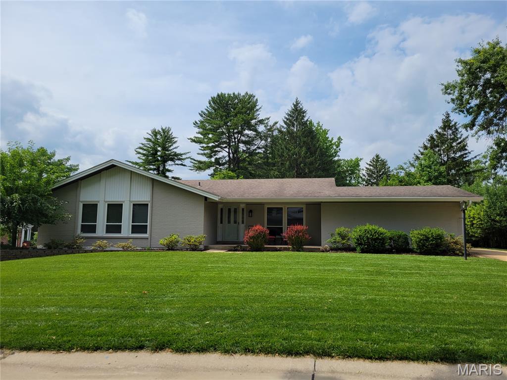 Welcome home to this well maintained 4-bedroom 3-bath ranch home in desirable Westbury Manor Subdivision.  The home features an open floorplan, spacious bedrooms, solid oak wood floors throughout, a woodburning fireplace and a large deck overlooking the private backyard.  You'll love the wonderful updates to the Kitchen with stainless appliances and beautiful granite countertops.  There is over 3000 sq/ft of living space including the well finished walkout lower level that features the fourth bedroom and third full bath along with a huge family room and a separate office/playroom.