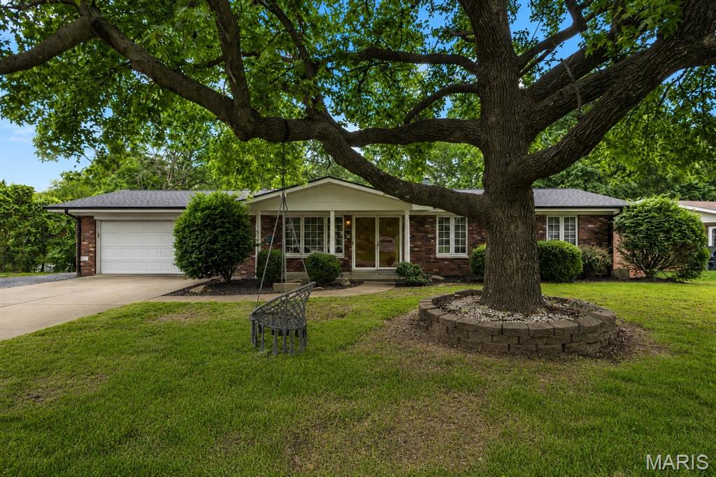 This full brick ranch offers plenty of space inside and out!!! The main level features 3 bedrooms, including a primary bedroom with a half bath. Enjoy the bright sunroom with vaulted ceilings that leads directly to the back deck.
The finished walk-out basement provides a large family and recreation area complete with a brick fireplace and sliding glass doors that open to a covered patio, along with a bar for entertaining. The lower level also includes a utility area with a half bath, separate shower, additional oven, laundry area, and plenty of cabinet storage.
Recent updates include new roof and gutters installed in February. The property also features an RV/carport with electrical service, perfect for your RV, camper, boat, or additional vehicles.
With multiple living spaces, abundant storage, and a great layout for entertaining, this home offers a wonderful opportunity to make it your own. Schedule your showing today!