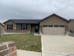 BRAND NEW home with every option you could imagine! They include vaulted ceilings, rounded “bullnose” corners, granite or quartz countertops, stainless steel appliances, 42" cabinets with "cushion close", custom neutral-colored paint job throughout, LVT flooring throughout most of the home, framed windows, taller baseboards, adult-sized cabinets in bathrooms with marble countertops, walk-in closets, upgraded carriage garage doors with openers on 2 CAR Garage, full bath rough-in, panel doors (many varieties), and upgraded water/light fixtures throughout the house! MAIN FLOOR laundry! Fully sodded yard (front/sides/back). *Pictures are of previously built homes. Builder/Broker* This home is USDA eligible.