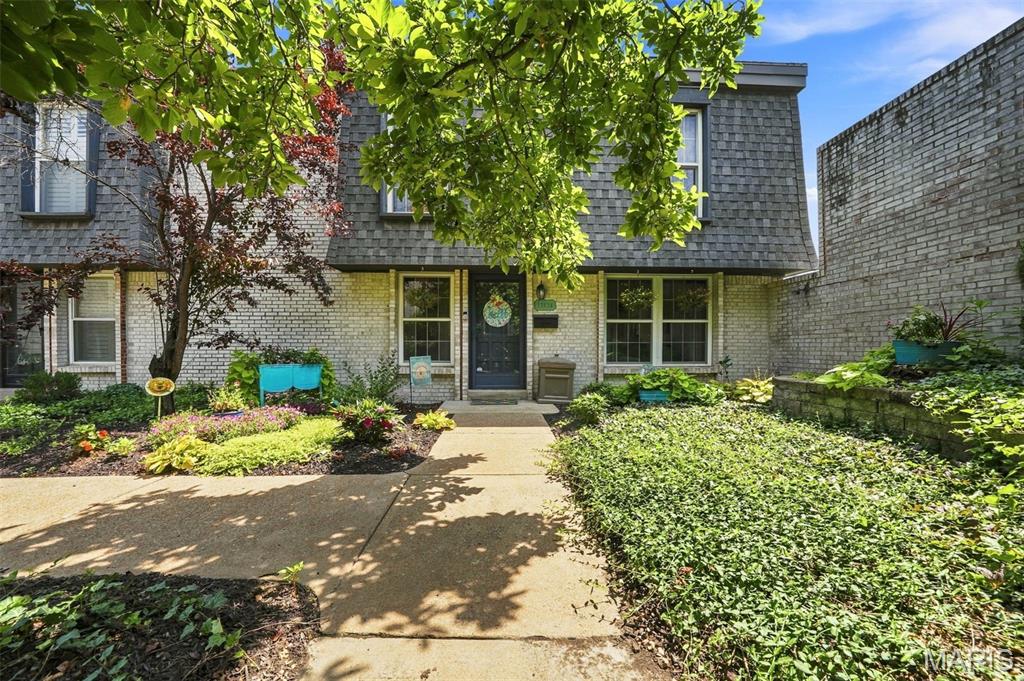 Imagine summer evenings on your oversized private deck, one of the many standout features of this Chesterfield gem! This move-in ready 3 bed, 2.5 bath townhouse offers stylish updates, spacious living areas, large dining room, a finished walk out lower level, and generously sized bedrooms. The bright kitchen with stainless appliances and open living room create the perfect space for everyday living and entertaining. You have your own private parking, in home laundry and an end unit.  Enjoy a carefree lifestyle with access to the community pool and clubhouse while being just moments from Chesterfield's best shopping, dining, parks, and highway access. Convenient, comfortable, and full of charm, this home checks all the boxes, don't miss this opportunity!