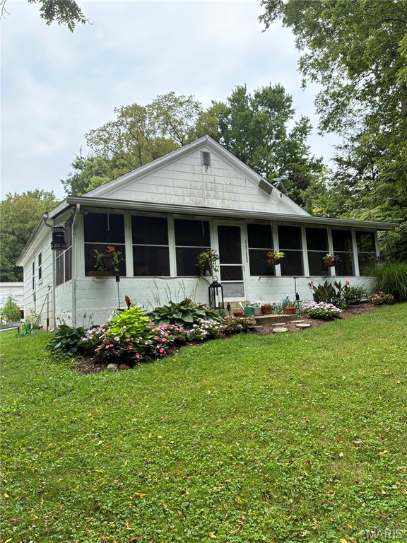 A rare opportunity in the heart of Flint Hill! 1765 Grothe Road offers 7+ private acres, incredible versatility, and the chance to create something truly special. Tucked away with plenty of room to spread out, this longtime family property is ready for a new owner with vision. The 2-bedroom, 1-bath home has been well loved over the years and is ready for updating, giving you the opportunity to renovate and make it your own. The electrical system has been updated, and the property offers the convenience of city water and sewer along with propane gas. Enjoy the porch area and peaceful setting surrounded by your own private acreage. Huge garage, workshop, or hobby space? This property delivers with a 3+ car garage, additional carport, and office area this are is ideal for vehicles, equipment, projects, storage, or a home workspace. Properties offering this combination of acreage, privacy, garage space, city utilities, and location are hard to find. Located in the Fort Zumwalt North School District and convenient to the surrounding Flint Hill and O’Fallon area. Whether you’re looking for a place to call home, room for your hobbies, or a property with exciting possibilities, 1765 Grothe Road is one you’ll want to see. Bring your ideas and imagine the possibilities!