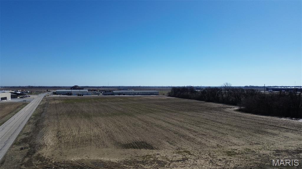 Located on Larcel Dive in Sikeston, Missouri, this industrial lot has easy access to Future Interstate 57 and minutes from the intersection of Interstates 55 and 57. Situated on a generous lot, this property offers extensive space ideal for industrial and commercial endeavors. Its strategic location in the Sikeston area provides a prime opportunity for businesses seeking to establish a strong presence in a thriving industrial and commercial hub. With its close proximity to major transportation routes and exceptional visibility, the property ensures optimal accessibility and exposure. The expansive lot not only allows for immediate utilization but also provides room for future expansion and customization, making it an attractive prospect for investors looking to capitalize on industrial and commercial growth opportunities.