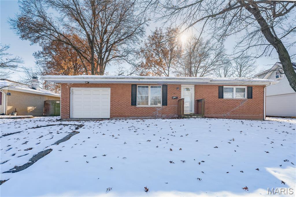 Welcome investors to 14 Wilson Park Dr. this home has so much to offer.  2 spacious bedrooms 1 full bath, full basement with a one car deep (23x11) attached garage all sitting private fenced backyard.  Home is a estate and has been in the family for quite some time. Nice size covered back porch (16x19) is off kitchen backdoor,  This home is located in Madison County with nearby schools including Granite City High School, Metro East Montessori School, and Rivers of Life Christian School.  Home needs some TLS.  Home sold being sold as-is. Seller will do no repairs, warranties, disclosures or inspections provided by the seller