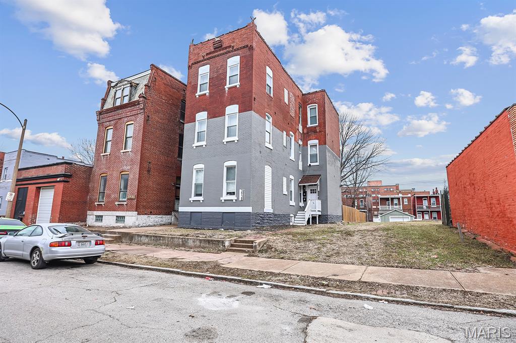 Introducing 3938 Iowa Avenue located in South St. Louis City. A three-story, two-unit multi-family property, with a unique two-toned painted brick exterior. The 1st floor unit is one bedroom and one bathroom and includes a kitchen with center island and private laundry room. The 2nd Floor unit covers the entire 2nd and 3rd floors of the building. 2nd Floor unit includes 3 bedrooms and 2.5 bathrooms, kitchen with center island, private laundry, primary bedroom with walk-in closet and full bathroom. The units share an exterior front entry and basement. Private rear yard and off-street parking available. First floor unit is vacant and available for showings. The 2nd Floor unit is tenant occupied with a lease ending 12/31/2026 at $1675/month and can be shown with an accepted offer.