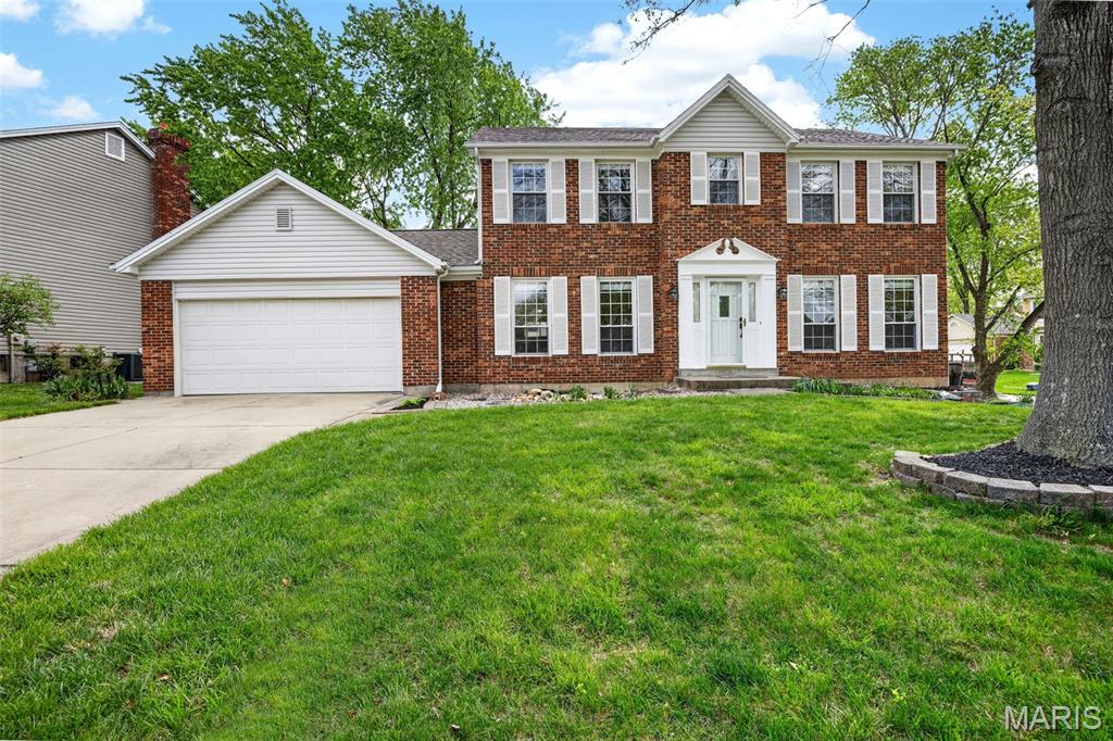 LOCATION, LOCATION, LOCATION! Welcome to this wonderful 4 beds/ 2.5 baths with 3000 sqft living space with oversized 2 car garage. Both the formal living & dining room have crown molding & neutral color. The family room has a Bay window, wood burning fireplace & crown molding too. The kitchen has wonderful solid wood cabinets, granite counter tops, a glass cook top & built in oven/microwave. On the first floor you'll find a Planning desk, a powder room & main floor laundry area (electric dryer hook up). The upper level has all 4 bedrooms & 2 full baths & the master suite has newer tile flooring, walk-in closet separate tub/shower & double sink vanity as well. The partially finished lower level offers a rec room with an additional home office area, large storage & second laundry area (gas dryer hook up). BRAND NEW ROOF (April 2026), NEWER SIDNG (January 2025), All bathrooms have GRANITE counter tops (2024), Primary Bathroom flooring (2021), Electric induction cooktop (2023), Kitchen granite counter top (2019), Primary bathroom shower (2019), Window replacement (2016), Window blinds (2018), Water heater (2016) & HVAC (2010). The home is located in a quiet neighborhood & Francis Howell school district & close to hwys 364/40 & near shoppings, parks!