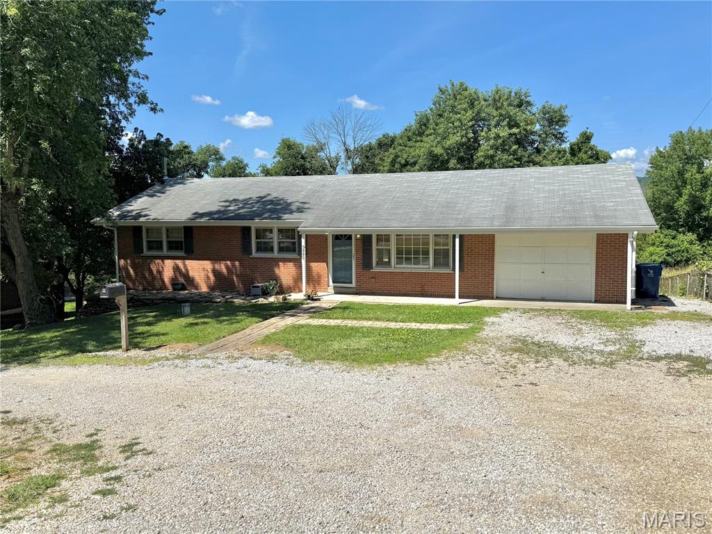 Welcome home to this Charming All brick Ranch Home in Byrnes Mill. This 3 Bed, unique 2 Bath, home features Hard wood floors throughout, composite deck great for entertaining, a temp controlled garage for the handyman. A Full walk out basement, Large fenced in yard and storage shed all for plenty of space to expand. Great location, just minutes from multiple grocery stores, restaurants and shops all while getting peace and quiet of country life!