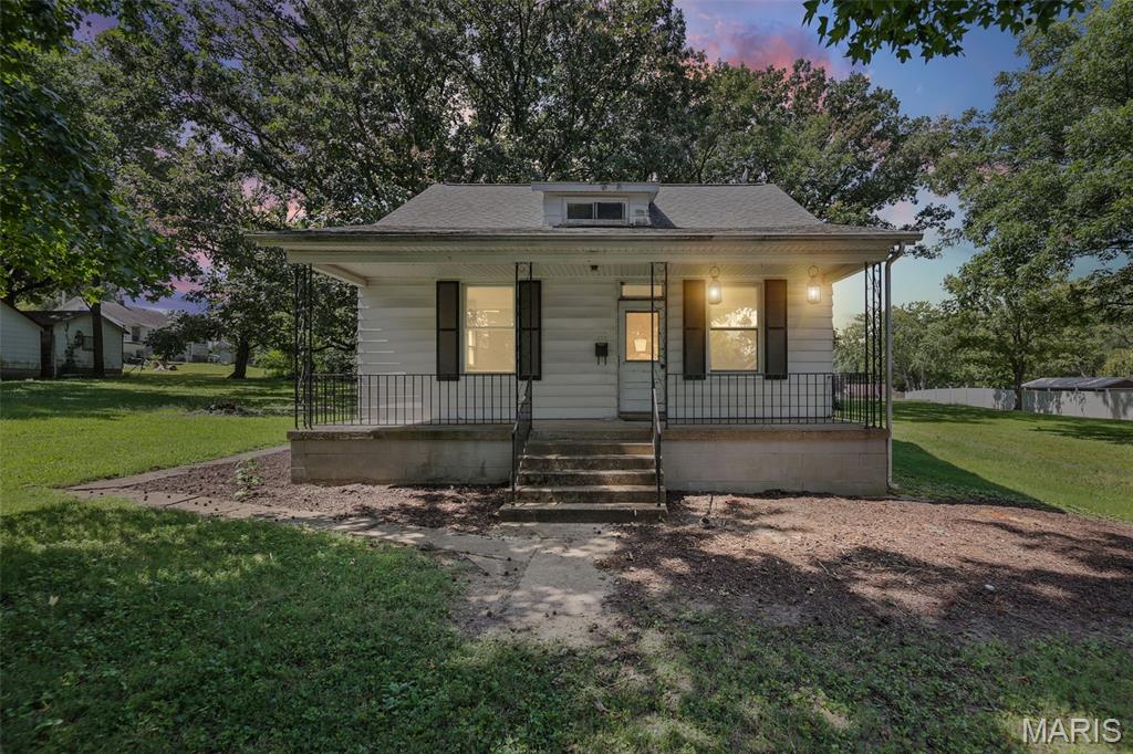 Investment opportunity on almost one acre in Lebanon. This home has a lot of potential for someone to create their ideal living space! Someone started the remodel and everything has been stripped down, ready for new construction. The floorplan is open with a kitchen, living room, family room or main floor bedroom and one full bath. The upstairs is wide open and did have two large bedrooms. That space is currently open to your designs. The roof has been repaired, no leaks. The AC and furnace are intact, but haven't been tested. There is also a basement with laundry hook ups. Seller financing options availble for qualifed buyers.