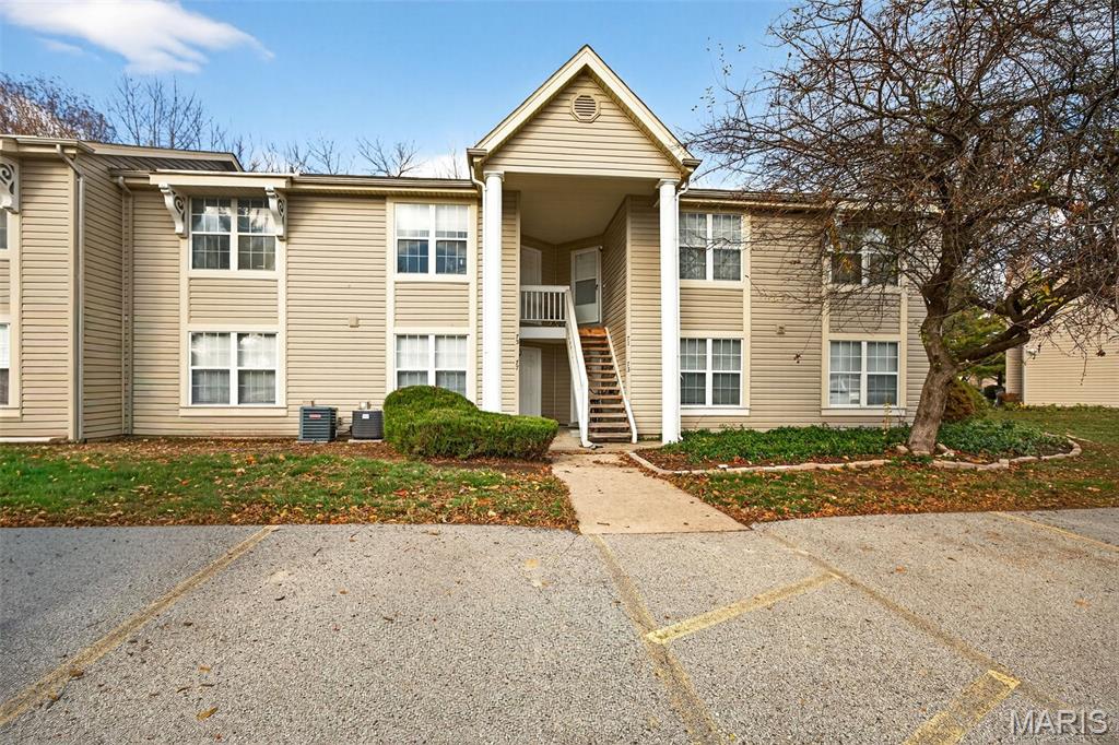 If you’ve been dreaming of living in the heart of St. Charles, this is your chance! This charming 2 bed, 2 bath condo offers the perfect blend of comfort, convenience, and privacy. As an upper-level unit, it feels tucked away while still placing you right in the center of shopping, dining, parks, and more. Step inside to a bright, sun-filled living space that immediately feels like home. The kitchen shines with white cabinetry and stainless steel appliances, opening into a spacious living room ideal for cozy nights in or hosting friends. When spring arrives, step out onto your brand new deck and enjoy peaceful views of mature trees—your own personal retreat. Residents enjoy access to a pool and clubhouse, plus the ease of included water, sewer, trash, exterior insurance, and two reserved parking spots! Make your appointment today and step into 2026 with a fresh start in a place that truly fits your lifestyle.