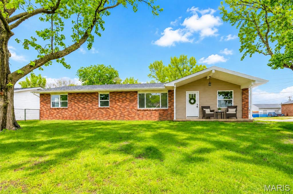 Motivated Seller! Uncover this beautifully renovated three-bedroom, two-bathroom ranch home located in the highly sought-after Kutter Aljets subdivision. This home radiates a clean and airy ambiance, enhanced by high-quality renovations and outstanding craftsmanship. The living, dining, and kitchen areas blend seamlessly, providing a spacious setting perfect for entertaining. The luxurious primary bathroom is equipped with a custom vanity, a tiled shower, and a generous walk-in closet. The stylish kitchen is adorned with white shaker cabinets, quartz countertops, and brand-new stainless-steel appliances. Nestled on a corner lot, enjoy the benefits of a new concrete back patio and ample parking space on the freshly poured driveway. This home is truly move-in ready, offering a fresh and inviting atmosphere. In 2026, updates were made to the electrical wiring, lighting, plumbing, flooring, drywall, paint, roof, windows, and siding. Come see it for yourself!