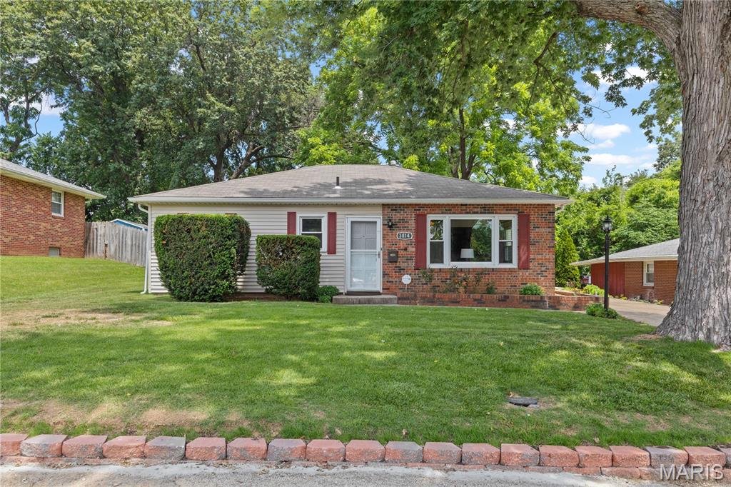 Welcome home to this charming 3 bedroom, 1 bathroom home offers the perfect blend of comfort, convenience and value. Everything is on the main floor including the primary bedroom, full bathroom and laundry. From the moment you arrive, you will appreciate the many updates that make this property move-in ready and easy to enjoy. Inside you will find a bright and inviting floor plan with plenty of natural light throughout.  
Recent improvements throughout the home provide peace of mind and modern appeal, allowing you to focus on enjoying your new space rather than tackling projects.  The detached one car garage adds convenience and extra storage, while the fenced yard offers room for outdoor entertaining, gardening or simply relaxing. Conveniently located near shopping, dining, parks and major roadways, this well maintained home is an excellent opportunity for first time buyers, downsizers or anyone looking for an affordable home with updates already completed. Don't miss your chance to own the darling Alton home - schedule your showing today! Roof,gutters, A/C and Furnace replaced in 2020, water heater 2021.