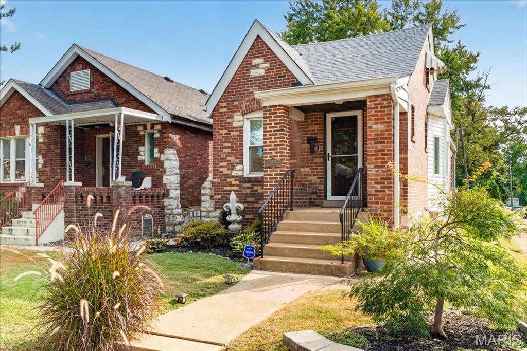 Welcome home to 3838 Bingham — a fully renovated-to-the-studs brick bungalow in the heart of walkable, tree-lined Bevo. This is a home that's been maintained, lived in, and truly loved, and it shows in every thoughtful detail.

Step through the heavy wood, historical front door into a large, light-filled living space, where beautiful decorative windows, pocket windows and a bay window, pair with recessed lighting to set a warm, welcoming tone. From here, stairs lead up to an open attic space, lovingly finished and versatile enough to serve as a bedroom or office retreat.

Down the hall, you'll find the first of two spa-inspired bathrooms, featuring a full soaking tub nestled within the shower. From there, step into the L-shaped eat-in kitchen and dining space, dressed in tile to the ceiling, stainless steel appliances, and rich wood floors throughout. Gorgeous windows with treatments filter in beautiful natural light and frame views of the tree-lined street beyond. The kitchen flows out to a screened sun porch, which leads into a lush garden retreat wrapped in a gorgeous paneled privacy fence, and beyond that, a rare California carport garage with street-side entry (not alley!) — a huge bonus.

Downstairs, the basement offers a bonus room, storage space, a second full spa-inspired bathroom, and a spacious laundry room, with a convenient side entrance for easy main-floor access.

Charming, private, and full of character — this Bevo gem is ready for its next chapter.